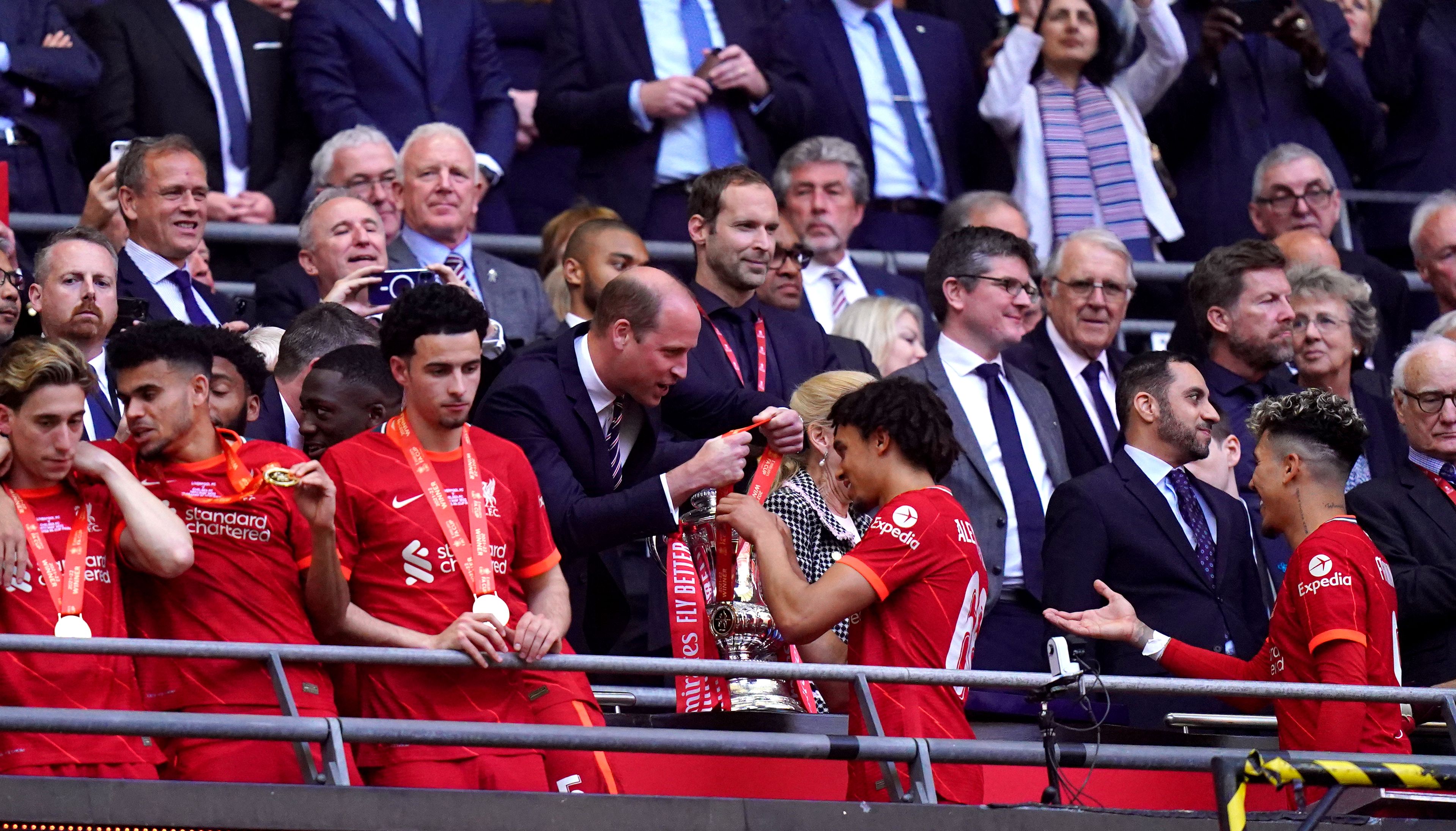 The Duke of Cambridge presents Liverpool's Trent Alexander-Arnold with his medal.