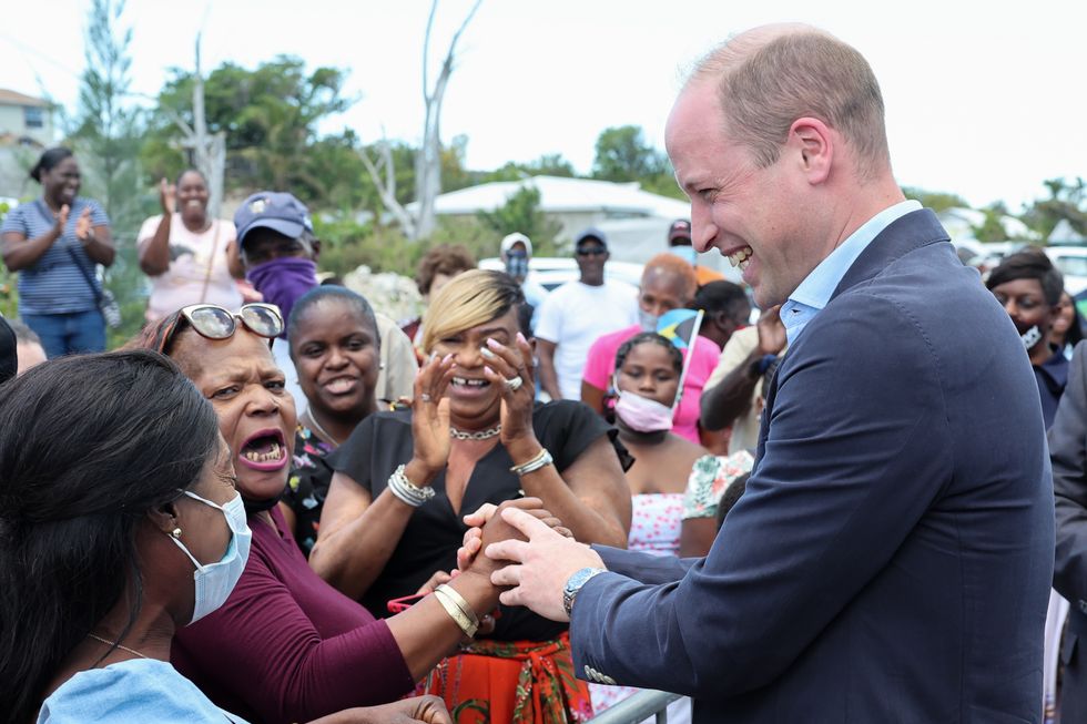 The Duke of Cambridge shakes hands with members of the public during a visit to a Fish Fry in Abaco, a traditional Bahamian culinary gathering place which is found on every island in the Bahamas, on day eight of their tour of the Caribbean on behalf of the Queen to mark her Platinum Jubilee. Picture date: Friday March 25, 2022.
