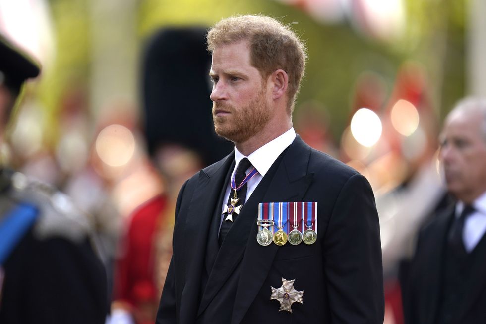The Duke of Sussex walks behind the coffin of Queen Elizabeth II, draped in the Royal Standard with the Imperial State Crown placed on top, as it is carried on a horse-drawn gun carriage of the King's Troop Royal Horse Artillery, during the ceremonial procession from Buckingham Palace to Westminster Hall, London, where it will lie in state ahead of her funeral on Monday. Picture date: Wednesday September 14, 2022.