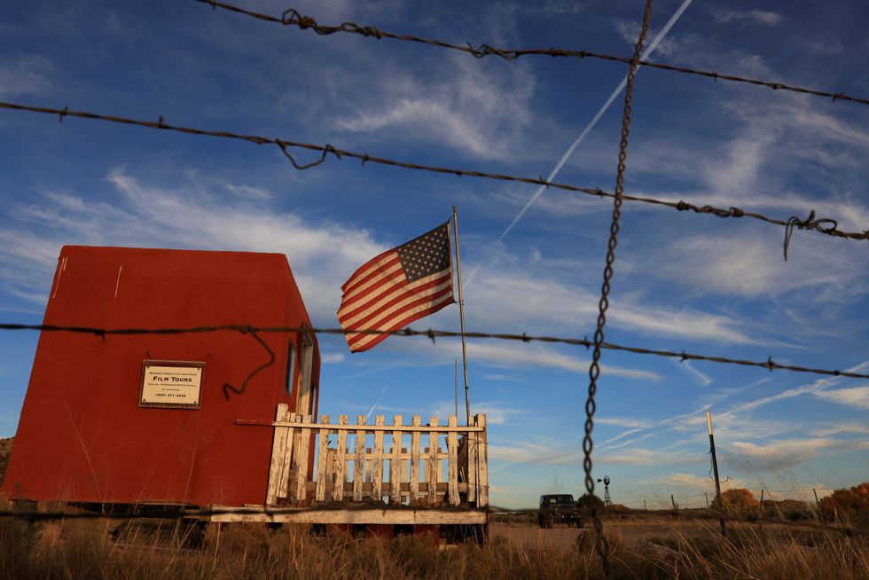 The entrance to the film set of \%22Rust\%22 is seen through a barbed wire fence after Hollywood actor Alec Baldwin fatally shot a cinematographer and wounded a director when he discharged a prop gun on the movie set in Santa Fe.