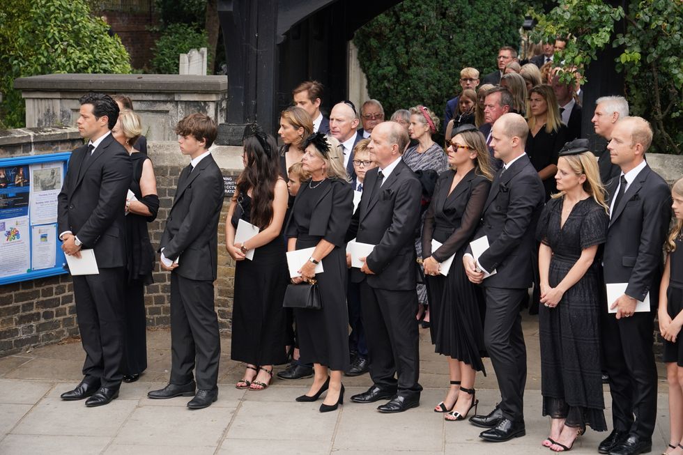 The family of Dame Deborah James, including husband Sebastien Bowen (far left), son Hugo Bowen (second left), and daughter Eloise Bowen (third left), leaving her funeral service at St Mary's Church in Barnes, west London. Picture date: Wednesday July 20, 2022.