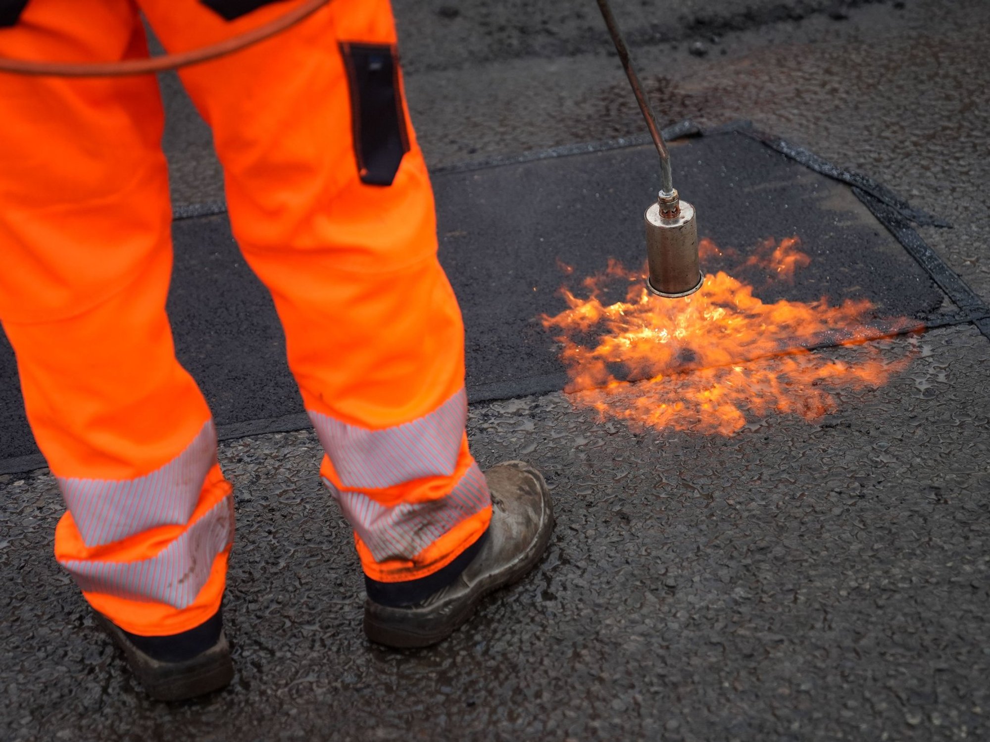 The figures present a stark contrast between councils for road repair
