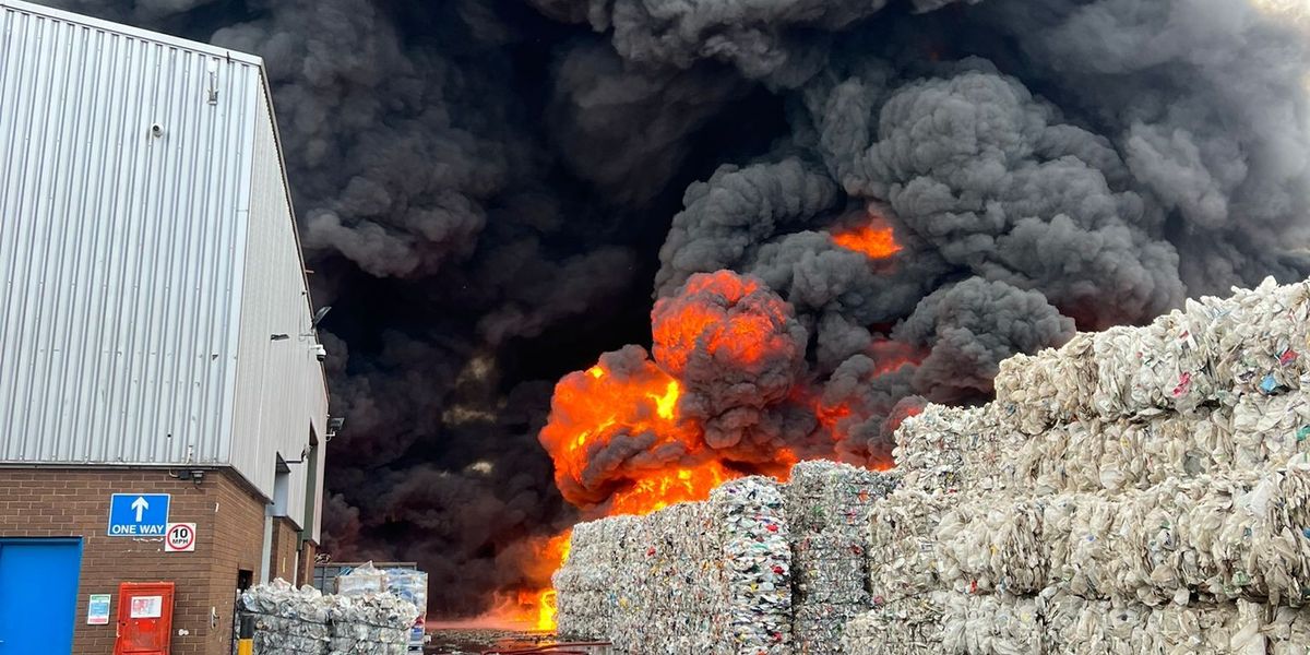 NextImg:Huge fire engulfs recycling warehouse as firefighters rush to tackle raging inferno