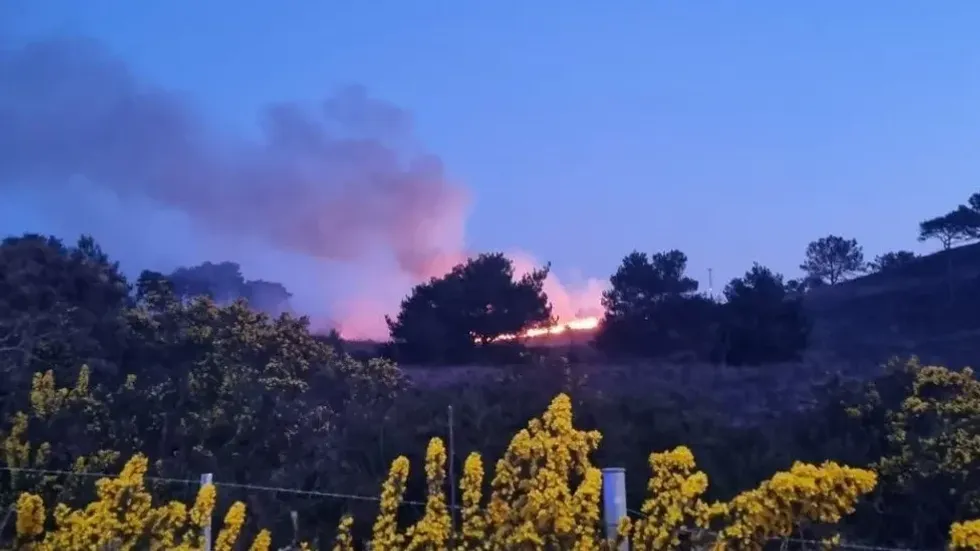 The fire service said multiple crews were also at a fire at Canford Heath