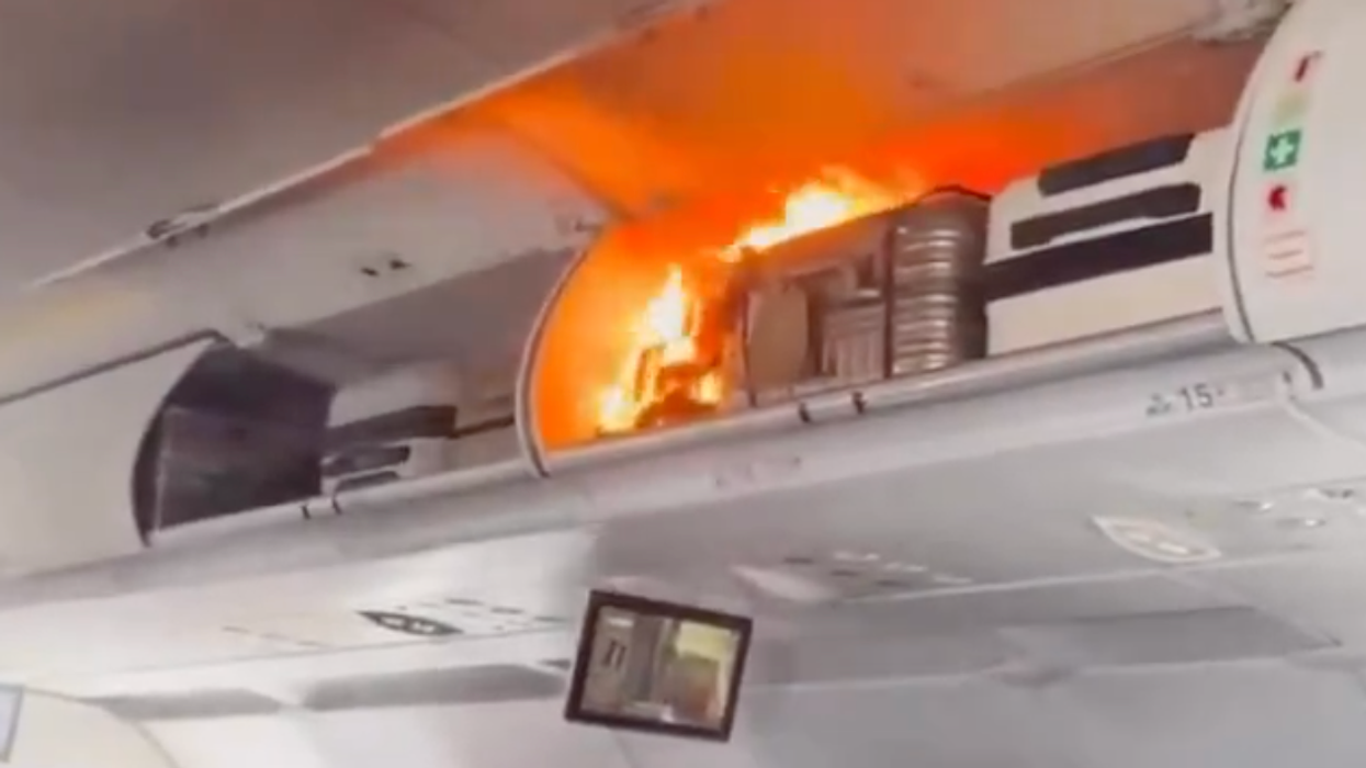 The fire took place in the overhead luggage compartment