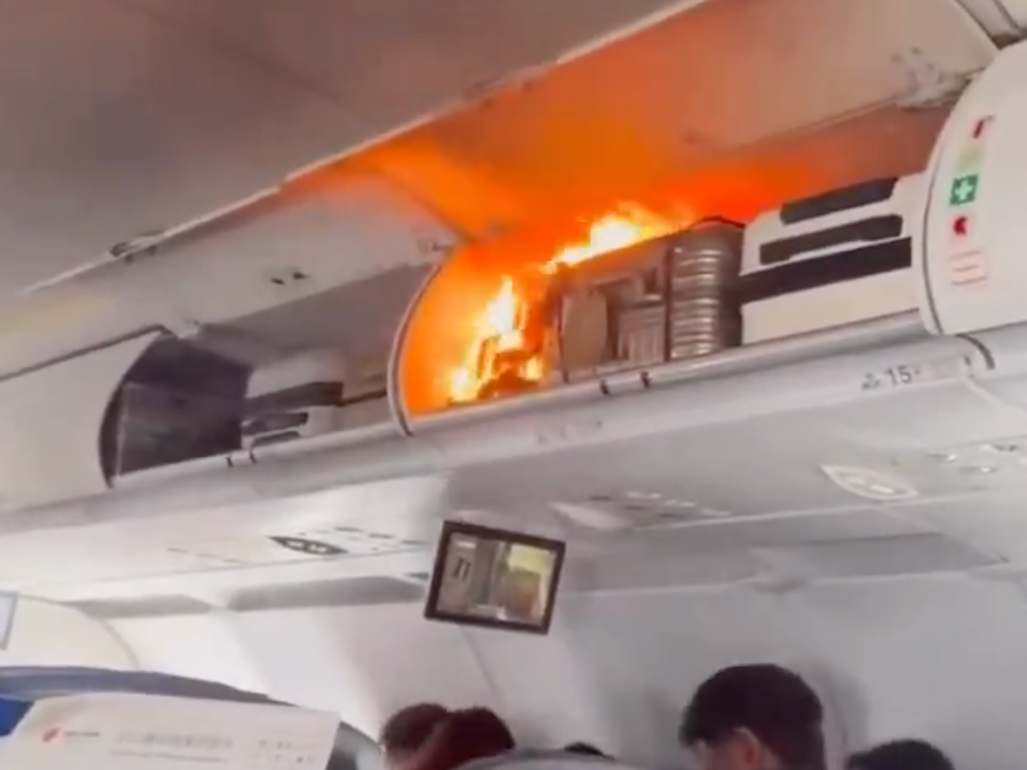 The fire took place in the overhead luggage compartment