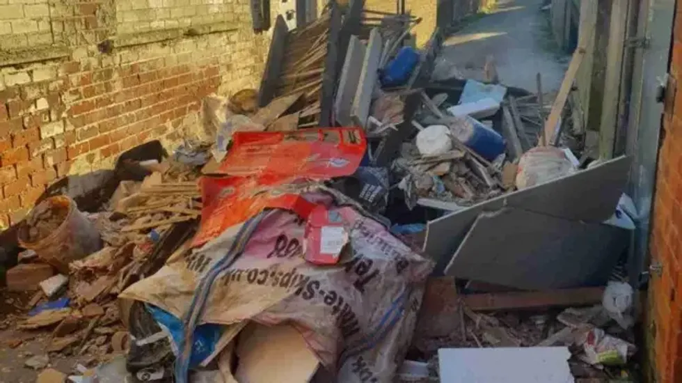 The fly-tipper has been fined \u00a3690 for leaving the dump behind the shop