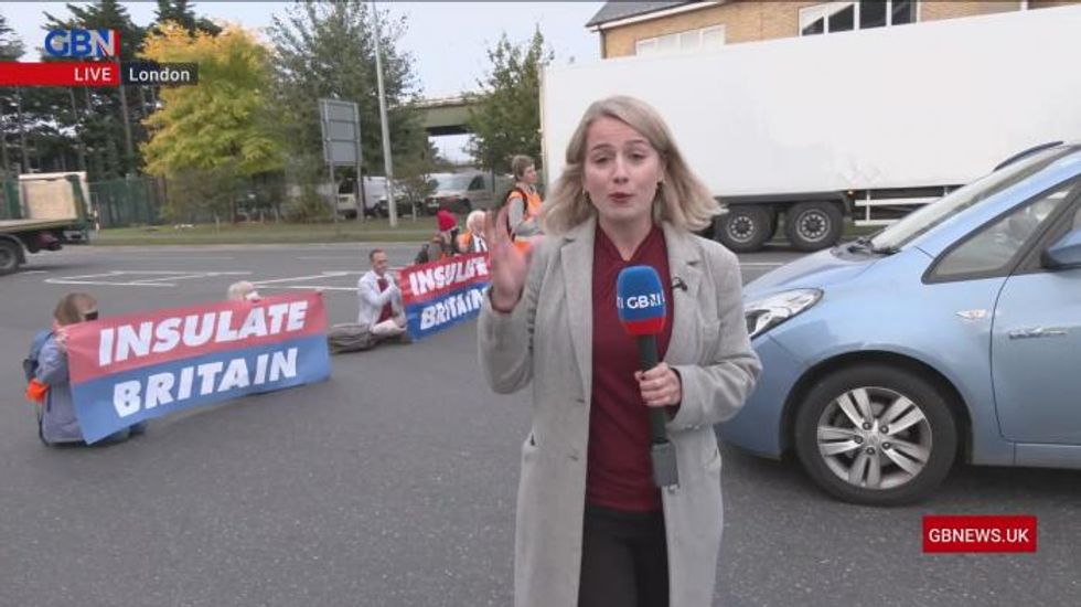 Insulate Britain in stand-off with lorry drivers on major London road