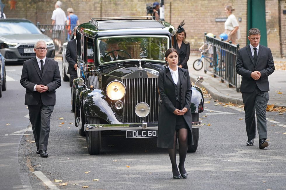 The funeral procession for Dame Deborah James arrives at St Mary's Church in Barnes, west London. Picture date: Wednesday July 20, 2022.
