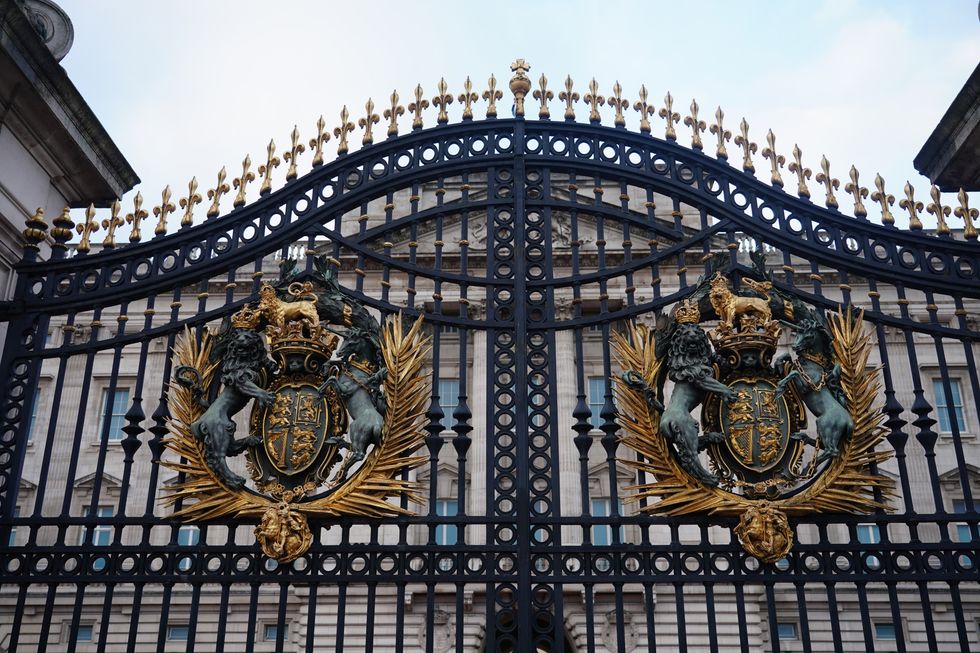 The gates of Buckingham Palace in central London after Queen Elizabeth II returned to Windsor Castle on Thursday after spending a night in hospital for what a Buckingham Palace spokesman described as %22preliminary investigations%22.