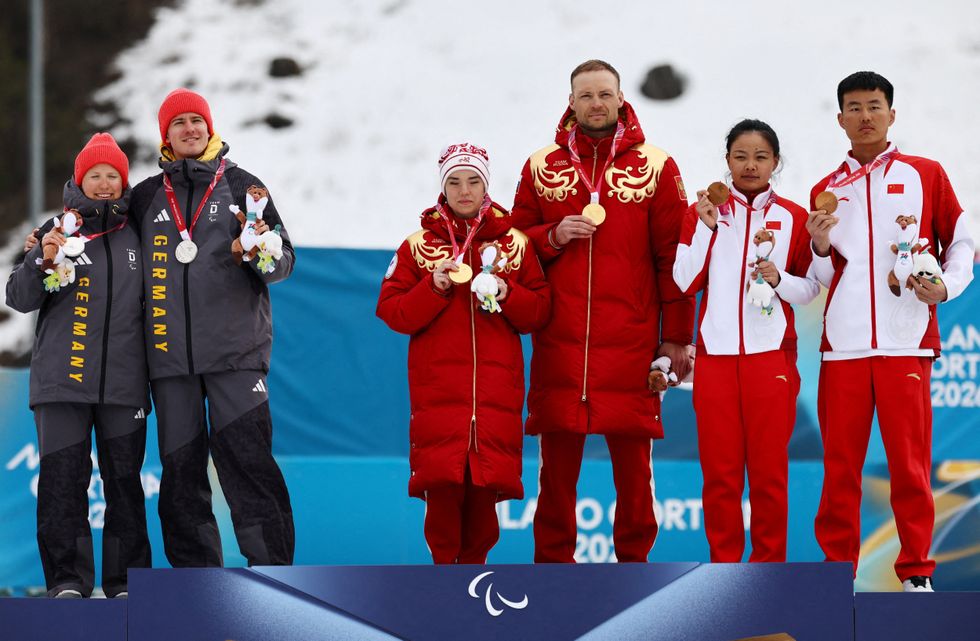 The German cross-country skiers stepped away from the Russians on the podium
