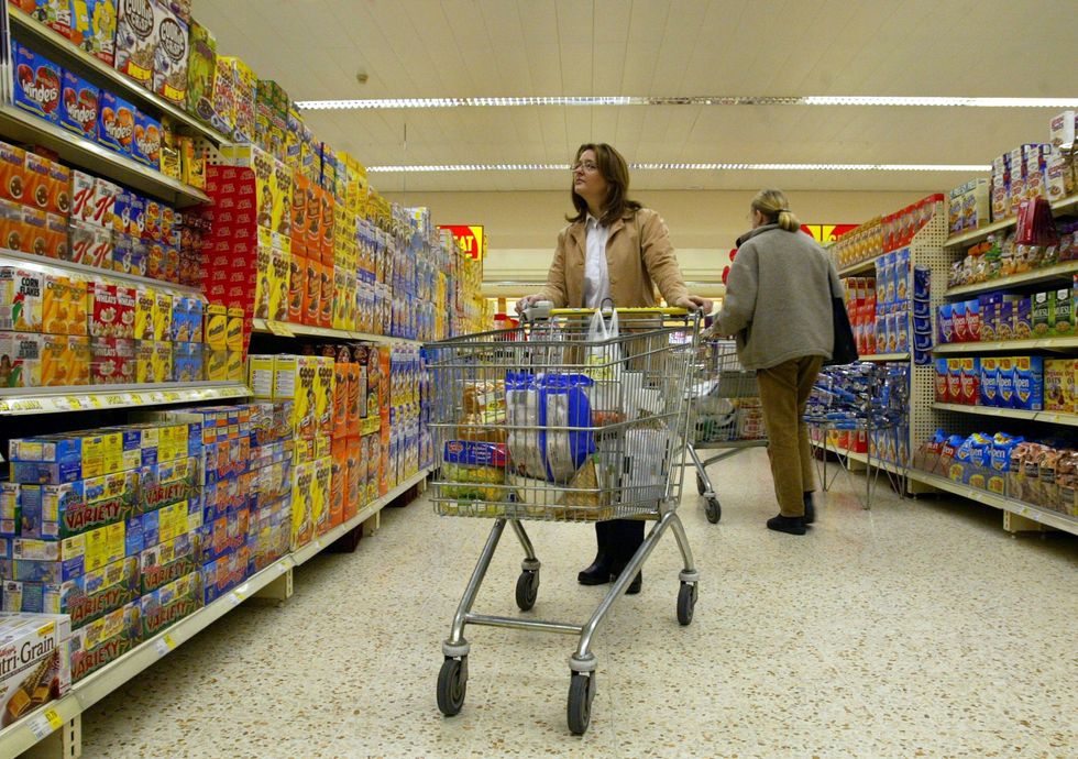 The Government is to delay a ban on buy one get one free deals for unhealthy food products due to the \%22unprecedented\%22 squeeze on living standards. The Department of Health and Social Care (DHSC) said the planned bar on multi-buy promotions on foods and drinks high in fat, salt, or sugar (HFSS) is being put back a year to October 2023.