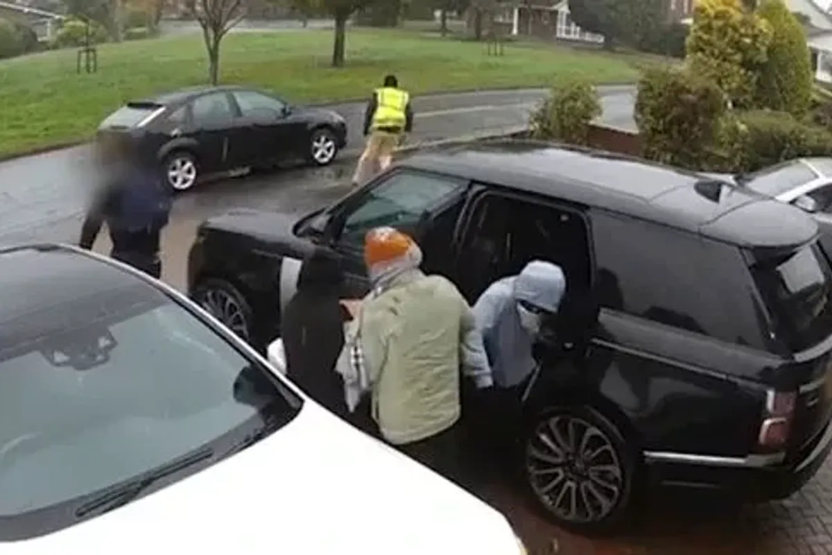 The group are seen getting into a Range Rover before fleeing on foot