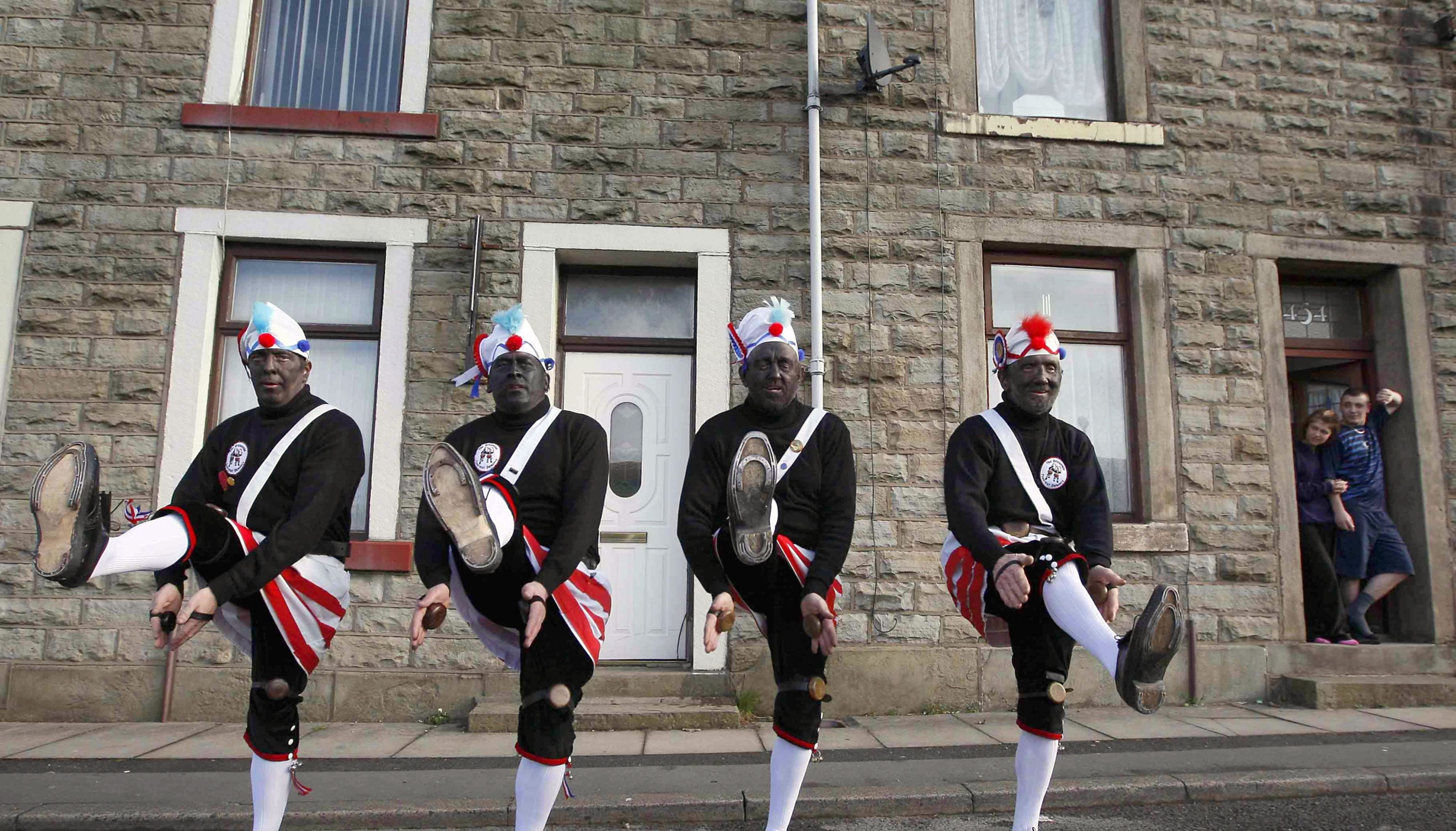 The group has faced increased criticism due to their costume.