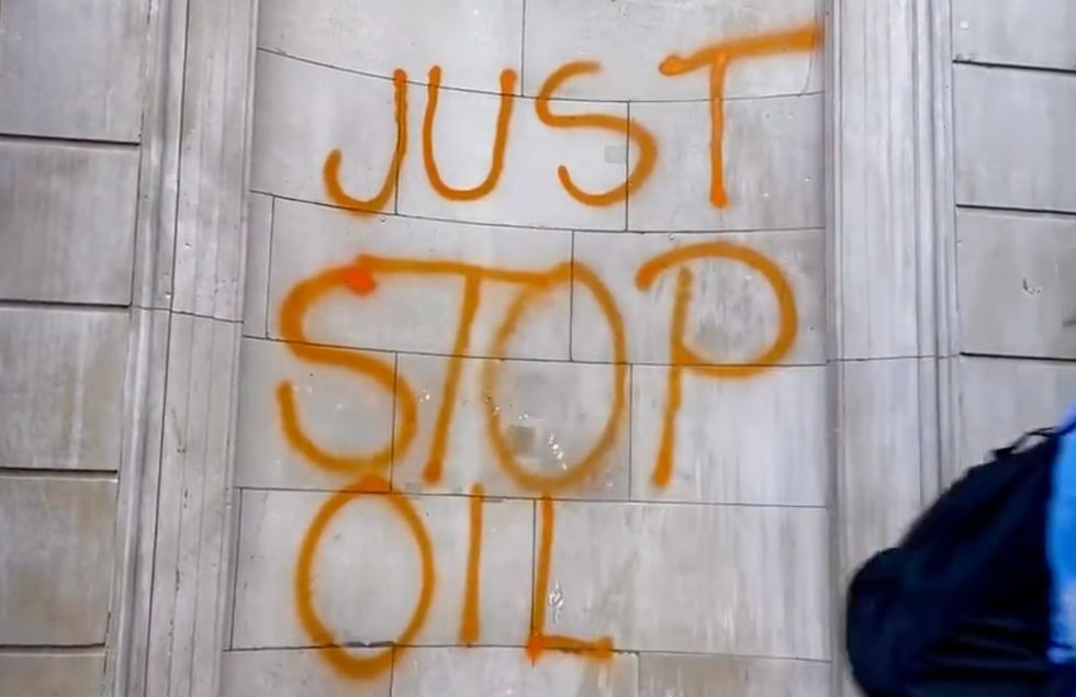 The group said a total of six supporters covered the buildings at around 8.30am on Monday