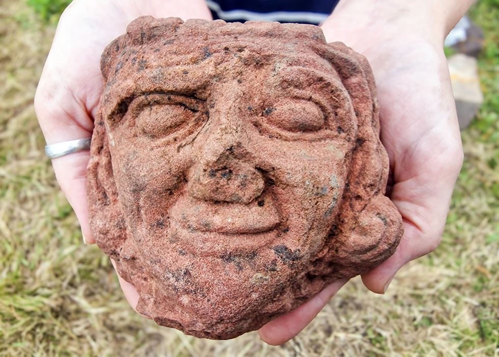 The head was found hidden on a large wall