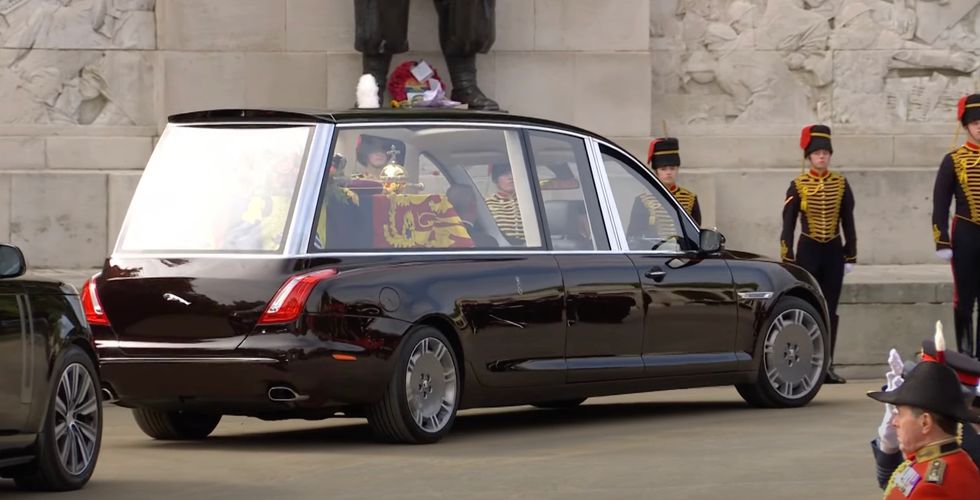 The hearse carrying Queen Elizabeth II's coffin leaves Wellington Arch