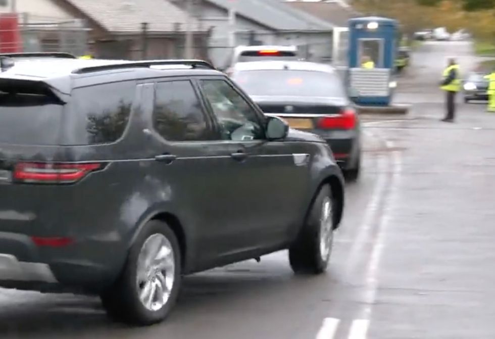 The Home Secretary then transferred from the Chinook to a black BMW