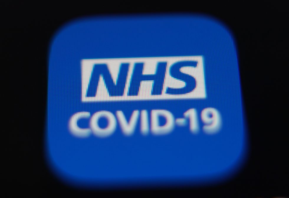 The icon for the NHS coronavirus contact tracing app is displayed on a mobile phone screen