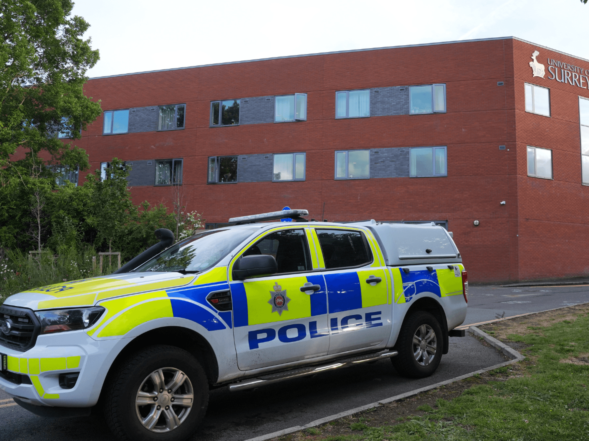 Man charged after Surrey University lecturer attacked with crossbow