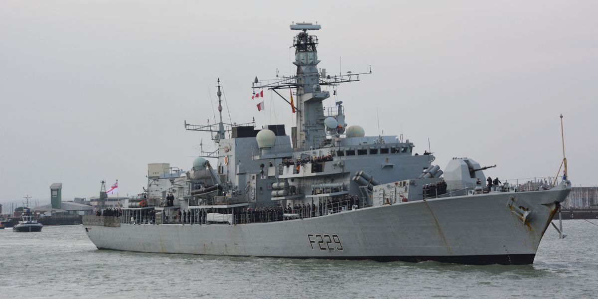 NextImg:Royal Navy chef avoids jail despite pulling male colleague's head into her chest and 'straddling' another during boozy party