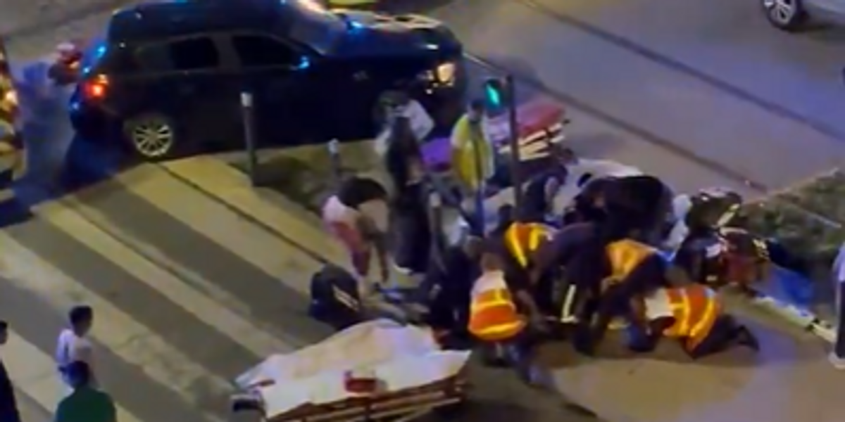 NextImg:At least four injured and one woman fighting for her life after car ploughs into crowd celebrating PSG's Champions League win