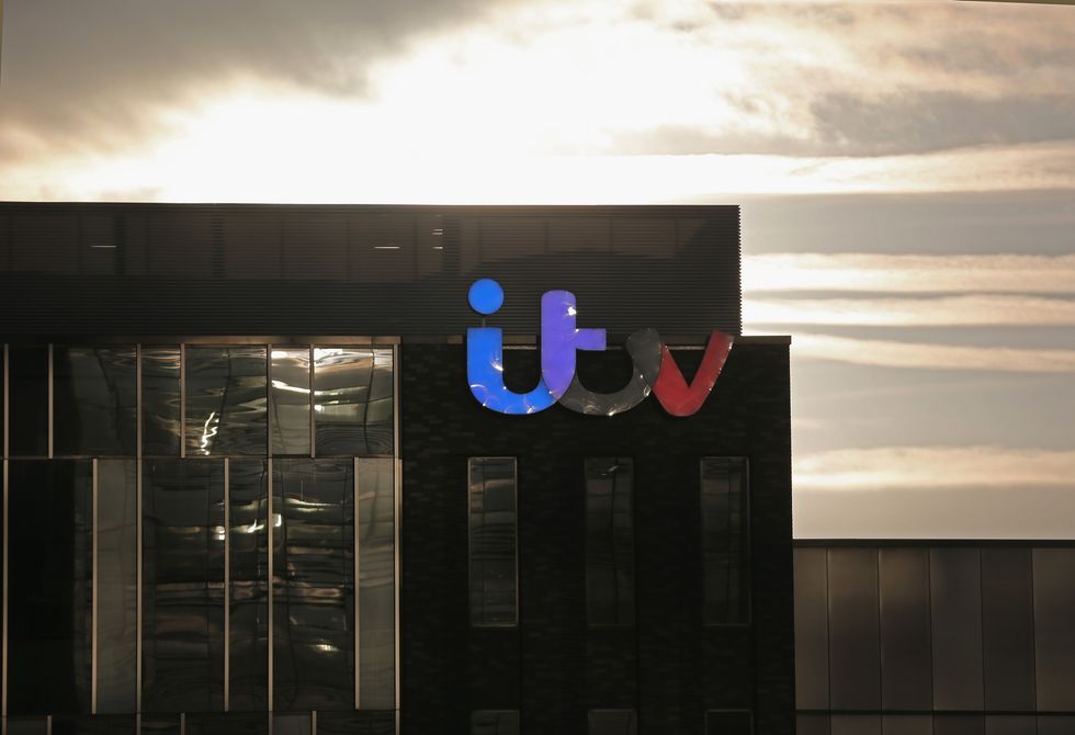 The ITV logo is displayed on studio buildings studios at Media City in Salford Quays