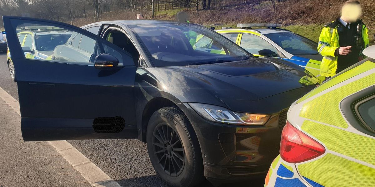 NextImg:Driver of 'runaway' electric Jaguar in court on fraud charges after 100mph motorway police incident
