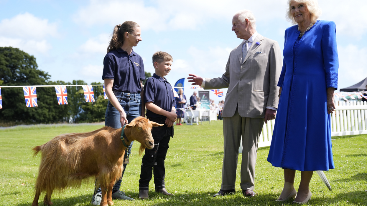 The King and Queen Camilla meet the Royal Golden Guernsey Goat
