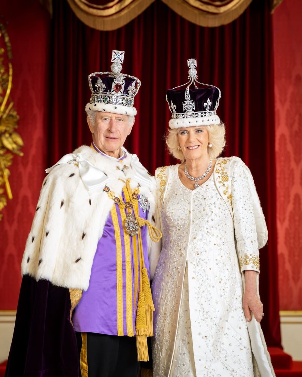 The King shared a separate photo of him standing side-by-side with his wife Queen Camilla