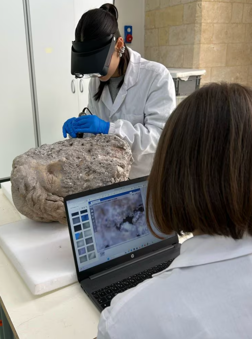 The layers of mortar make it difficult for archaeologists to fully examine and interpret the ancient artefact