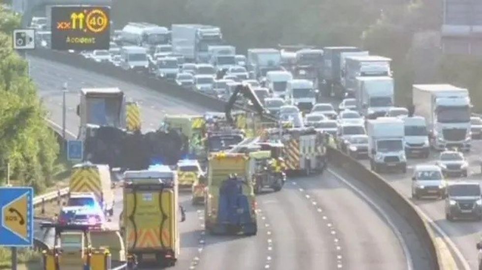 The M25 was closed for 12 hours yesterday following a fuel and waste spillage