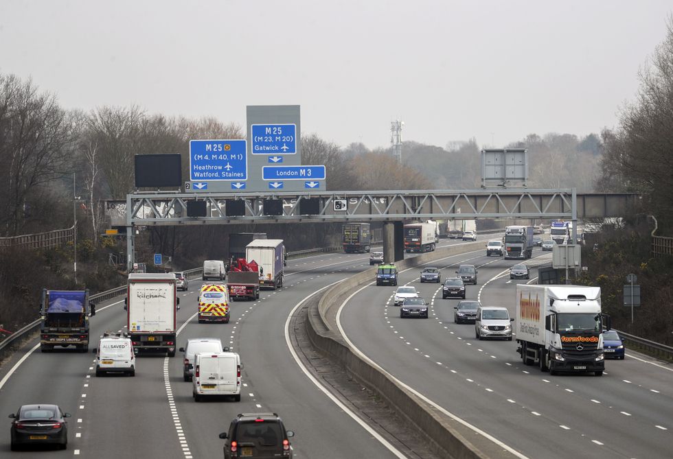 The M3 smart motorway near Longcross in Surrey. The motorways have no hard shoulder for emergencies, and use technology to close off lanes. Claire Mercer, the wife of man who died on a smart motorway has paraded his image on giant screen outside a police headquarters as she demanded officers investigate Highways England over his death. Picture date: Tuesday March 2, 2021.