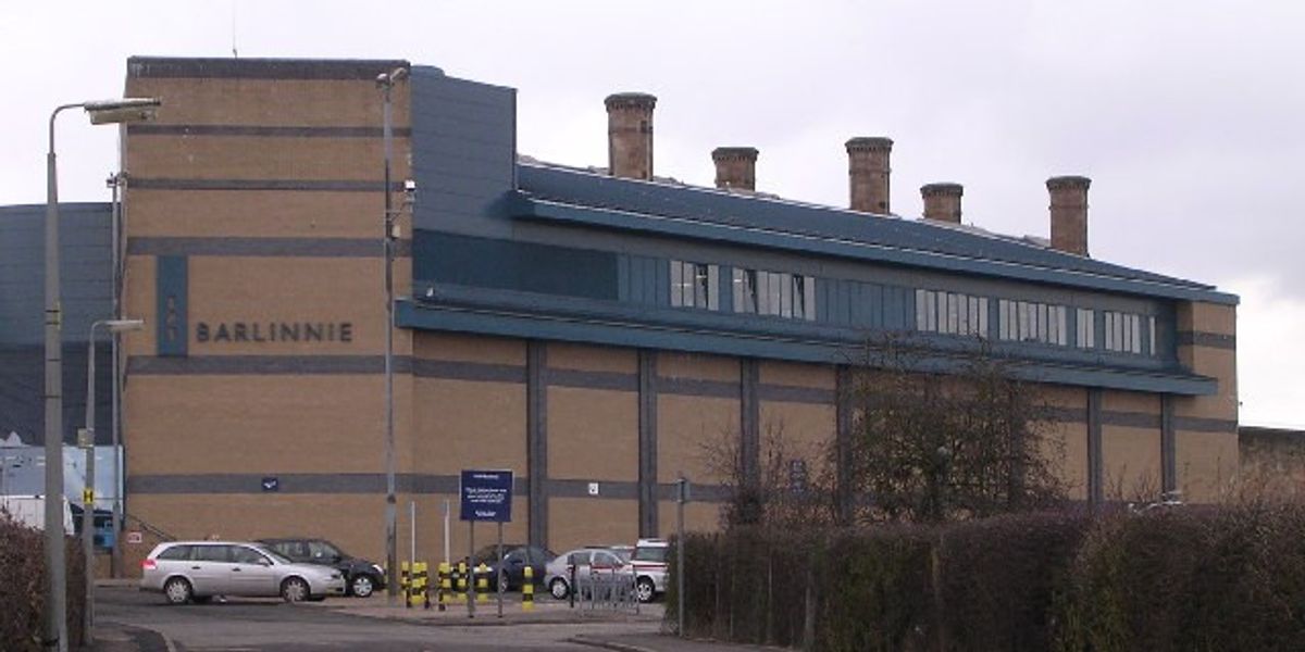 Prison inmate climbs onto roof before 'throwing slabs at officers'