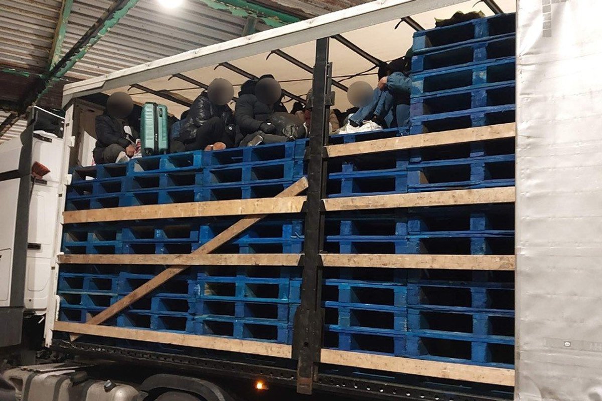 The migrants in the back of the lorry
