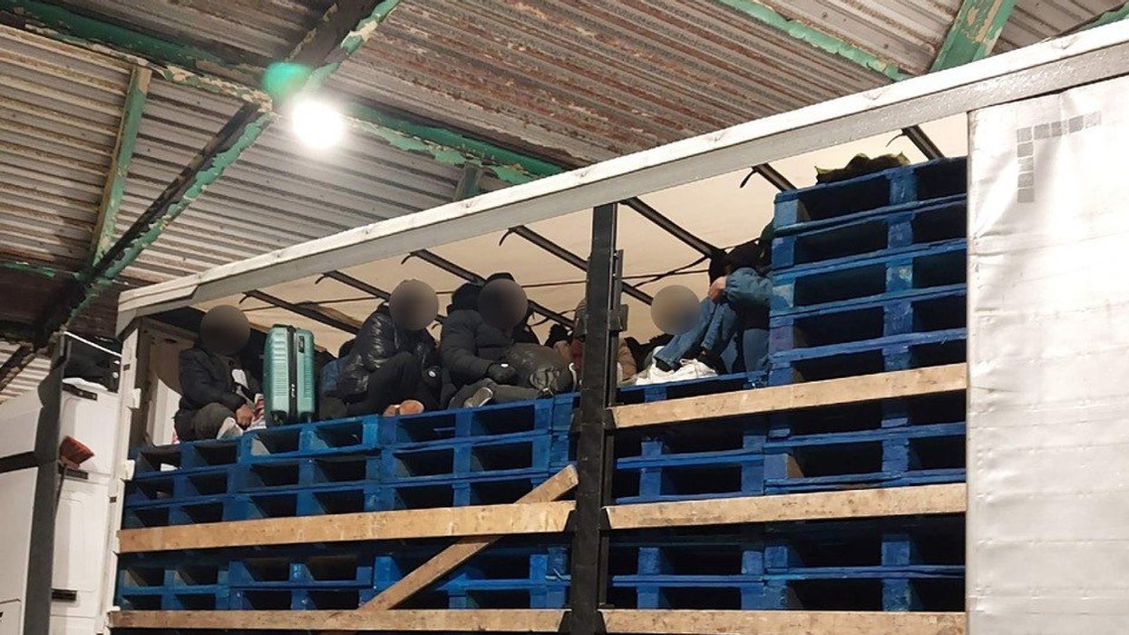 The migrants in the back of the lorry