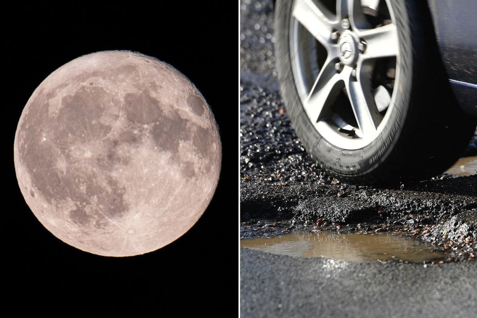 The moon and a car driving over a pothole