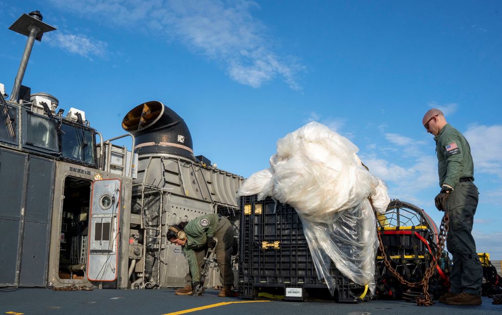 The navy has recovered the first suspected 'spy' balloon from China