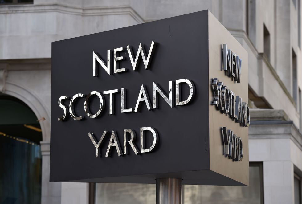 The New Scotland Yard sign outside the headquarters of the Metropolitan Police (stock image).