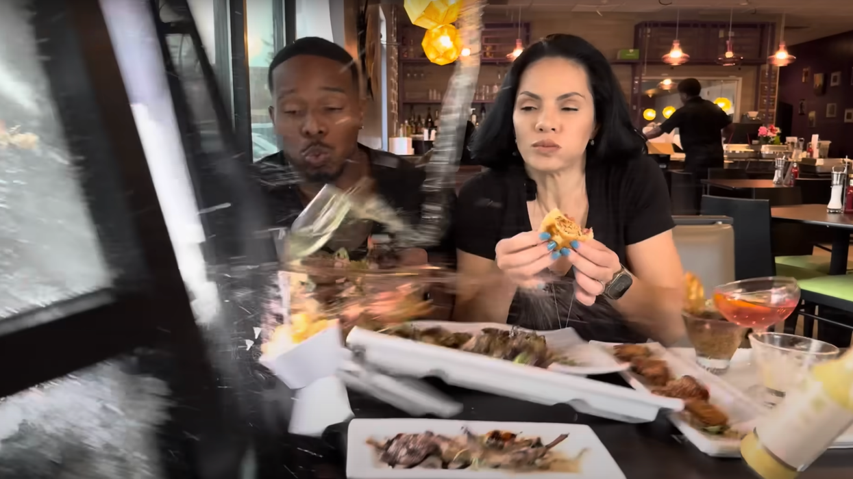 Food influencers hit by car while recording burger review in restaurant