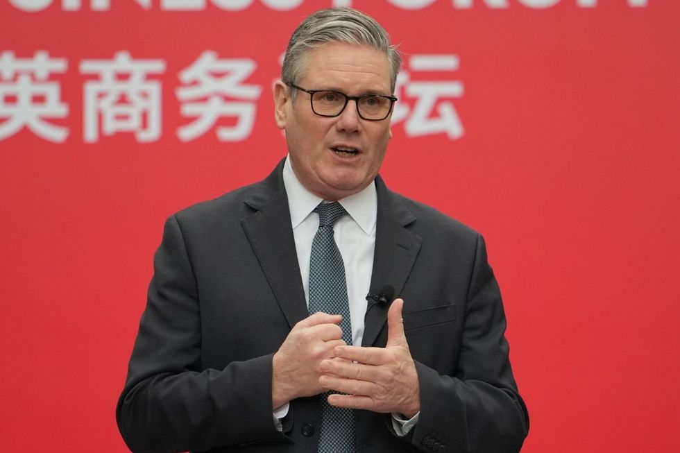 The Prime Minister was pressed on new revelations in the Epstein files about the former prince by reporters as he flew back from a four-day trip to the Far East