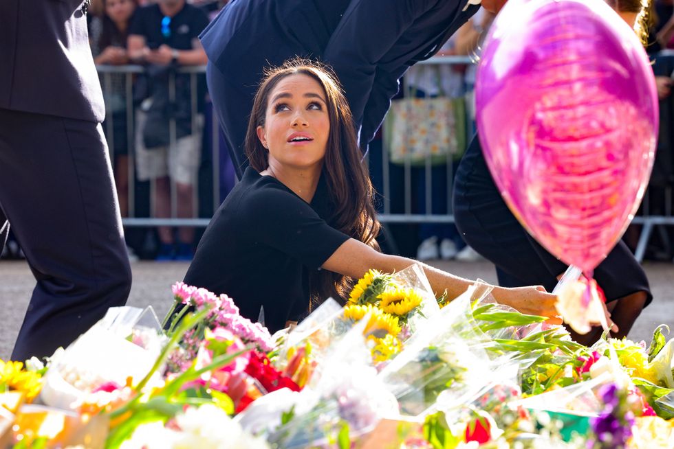 The Prince and Princess of Wales and the Duke and Duchess of Sussex viewing the messages and floral tributes left by members of the public at Windsor Castle in Berkshire following the death of Queen Elizabeth II on Thursday. Picture date: Saturday September 10, 2022.