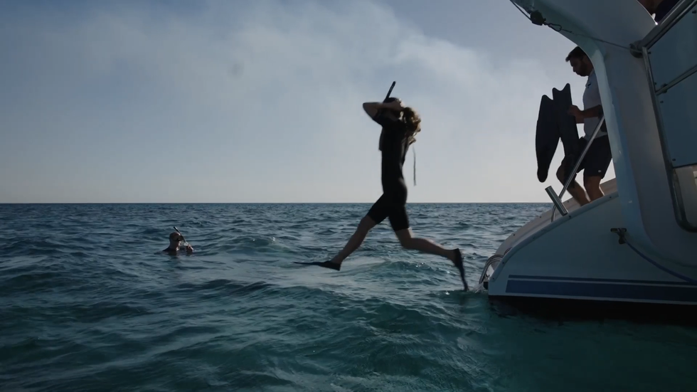 The Prince and Princess of Wales go scuba diving