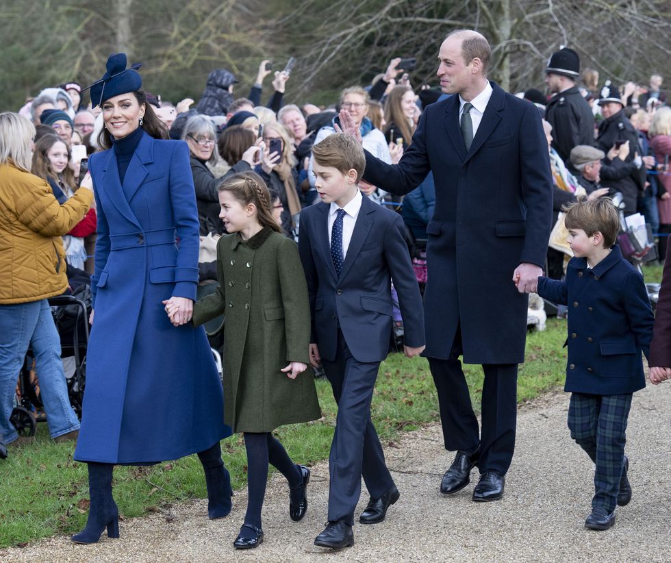 The Prince and Princess of Wales with children.