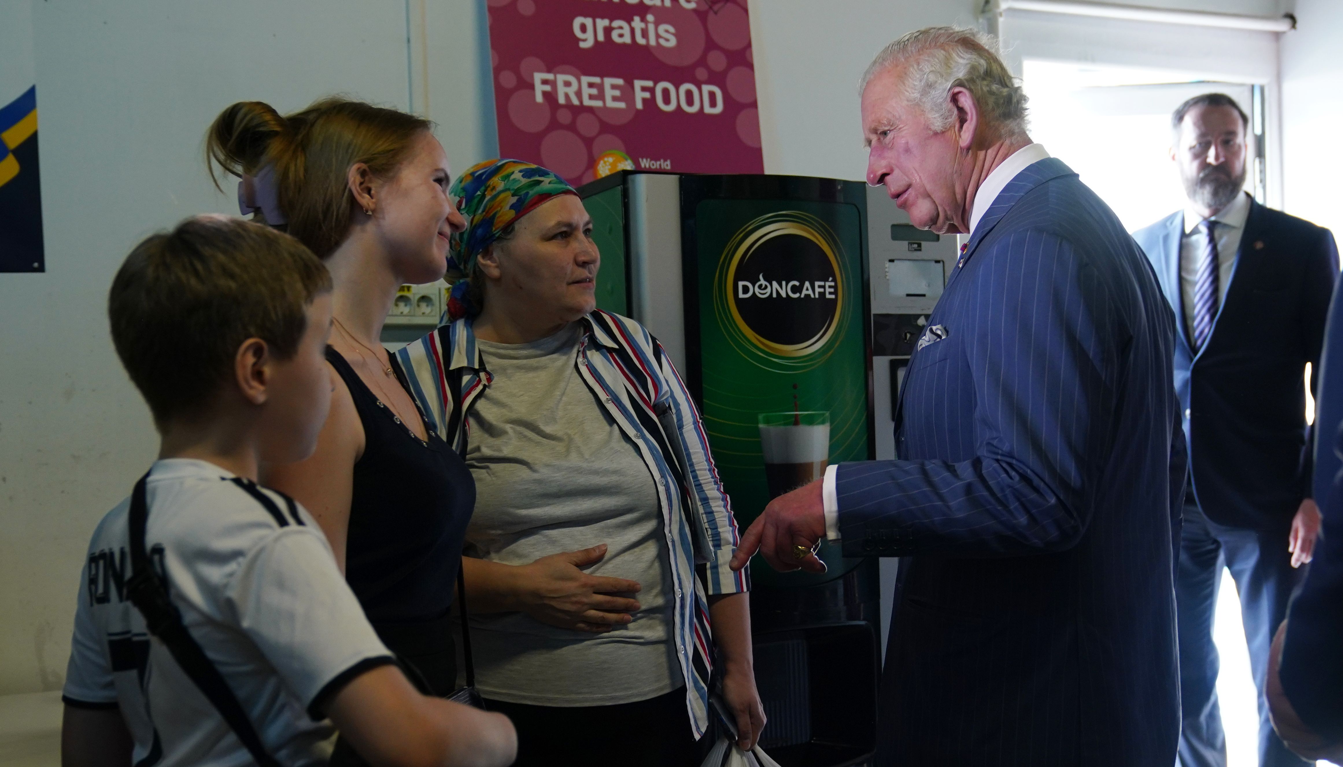 The Prince of Wales during his visit to the Ukrainian refugee centre in Bucharest, Romania. Picture date: Wednesday May 25, 2022.