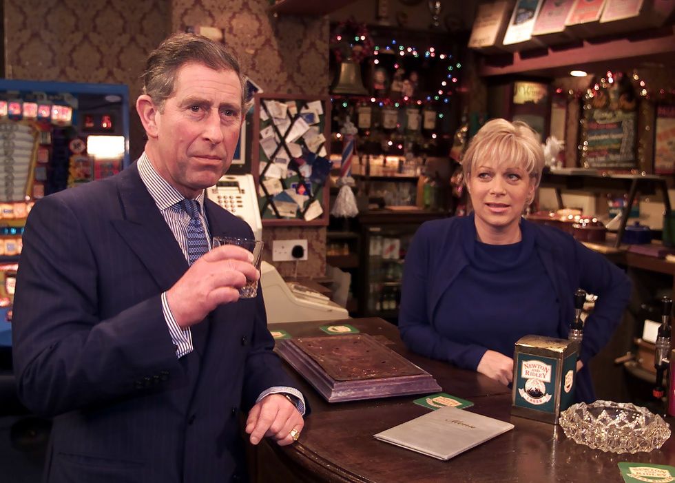 The Prince of Wales enjoys a scotch with Coronation Street's landlady Natalie Barnes played by Denise Welch in the Rovers Return pub