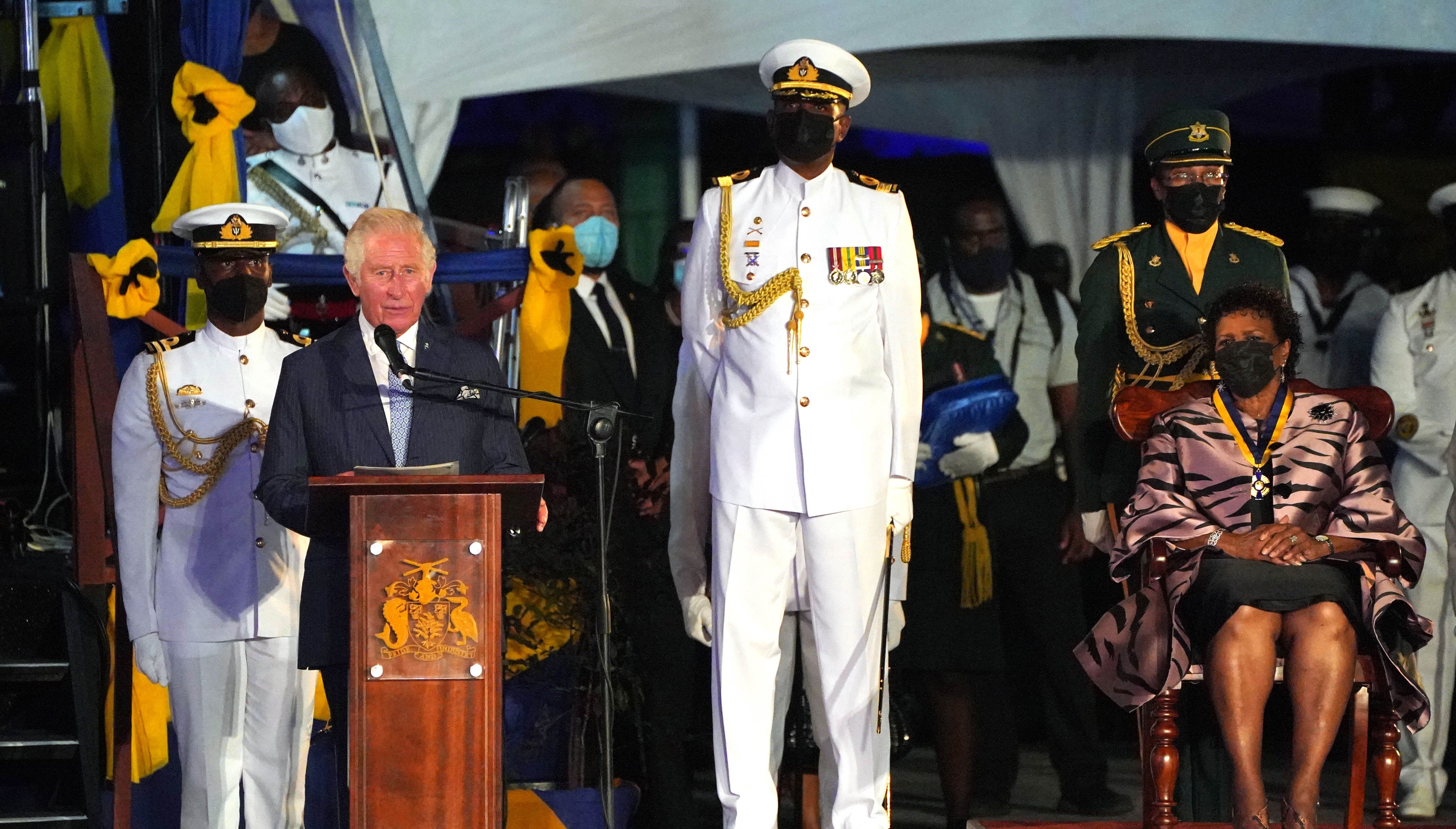 The Prince of Wales (left) makes a speech in Heroes Square in Bridgetown Barbados following a ceremony to mark the country's transition to a republic within the Commonwealth