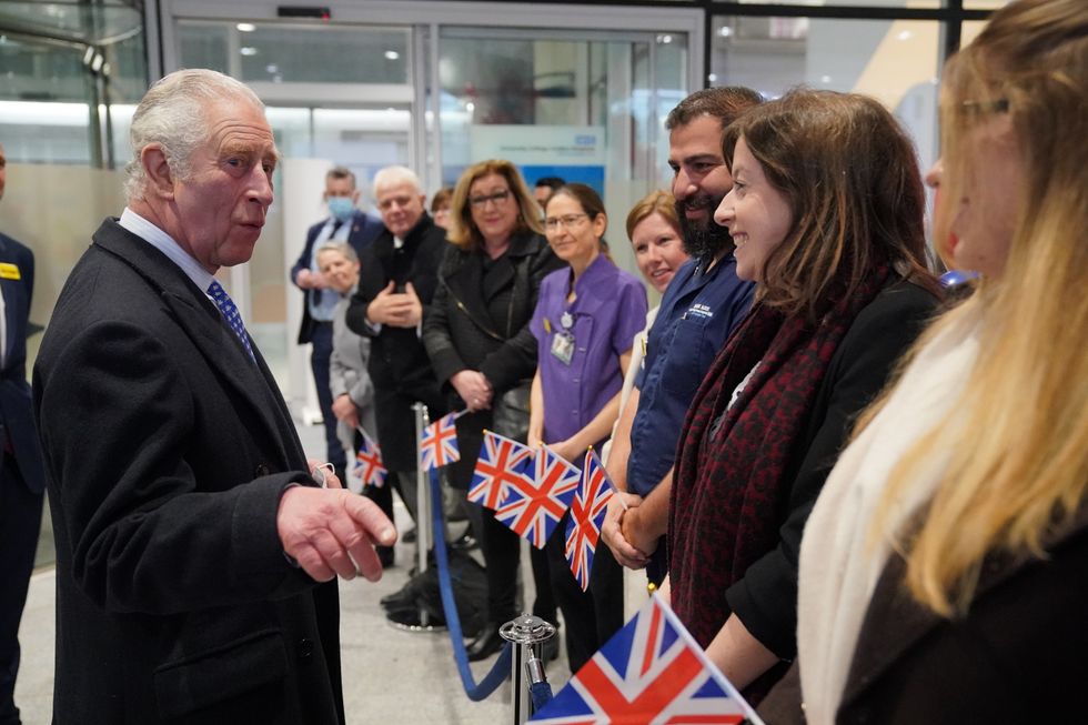 The Prince of Wales (left) meets staff during his visit to open the Grafton Way Building, University College Hospital's new flagship cancer and surgery building in London. Picture date: Wednesday March 2, 2022.