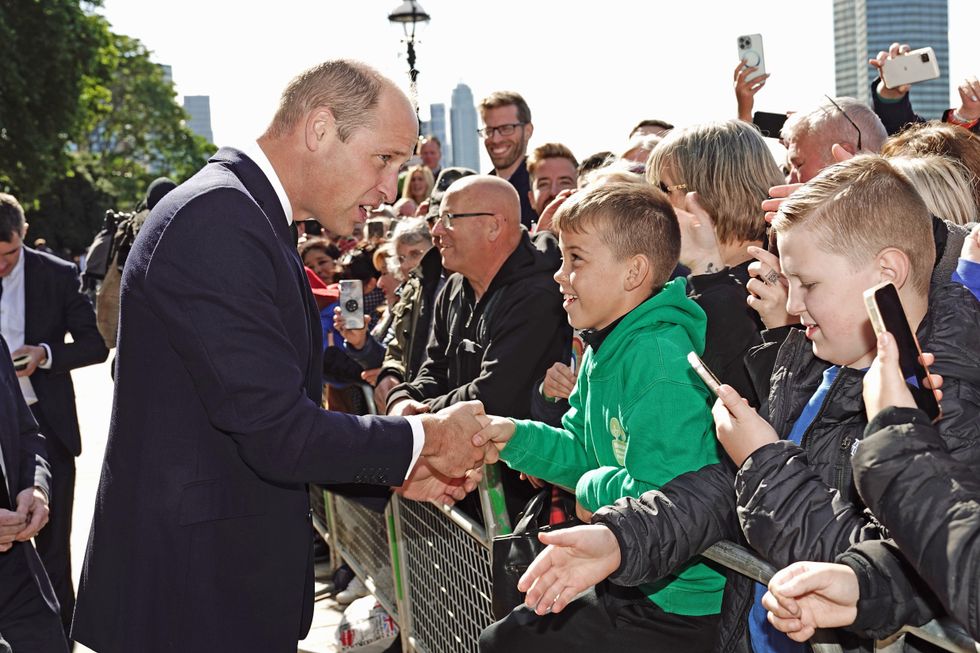 The Prince of Wales meets members of the public in the queue along the South Bank, near to Lambeth Bridge, London, as they wait to view Queen Elizabeth II lying in state ahead of her funeral on Monday. Picture date: Saturday September 17, 2022.