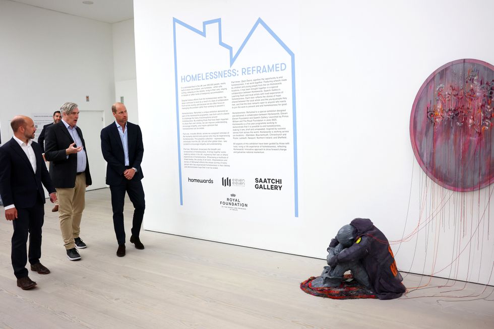 The Prince of Wales (right) during a visit to the Saatchi Gallery in Chelsea